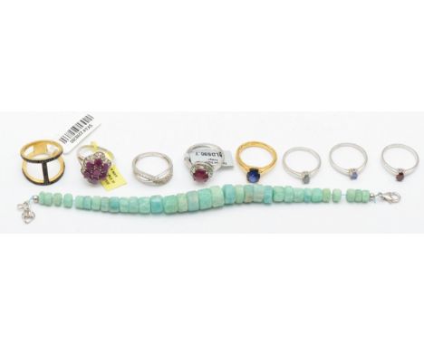 Eight silver gem set rings to include ruby, and a bracelet, 