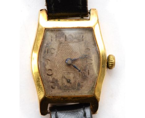An 18ct gold Art Deco manual wind gentleman's wristwatch, silvered dial, the case with floral engraved sides, 15 jewel moveme