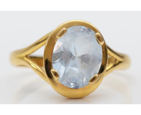 A 750 gold synthetic blue spinel dress ring with continental control mark, Q, 3.6gm. 