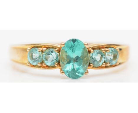 A 9ct gold apatite dress ring, S, 2.8gm.Condition report - Overall condition is good, with a small build-up of dirt to the se