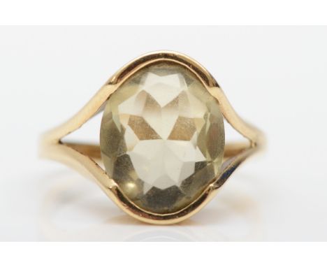 A 9ct gold abstract citrine dress ring, N, 4.1gm. 