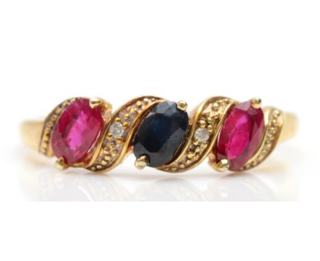 A 9ct gold three stone ruby and sapphire dress ring, P, 1.6gm. 