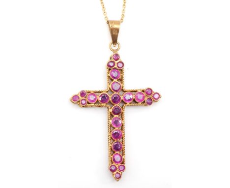 A 9ct gold synthetic ruby and sapphire cross pendant, 34 x 22mm, on chain, 2.5gm. 