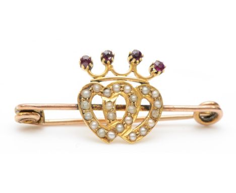 A Scottish unmarked gold ruby and seed pearl luckenbooth brooch, 36 x 16mm, 2.8gm. 