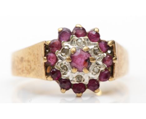 A 9ct gold ruby and diamond cluster ring, P-Q, 3.8gm. 