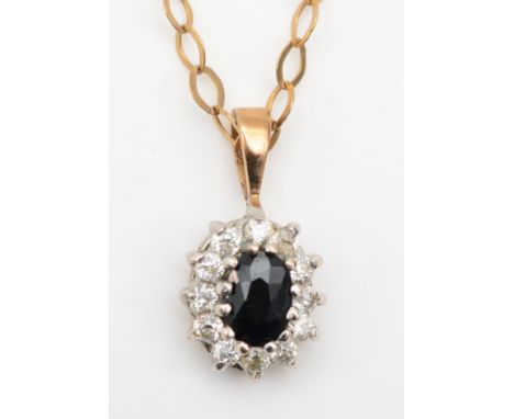 A 9ct gold sapphire and cubic zirconia cluster pendant, on chain, 16 x 7mm, 2.2gm. 