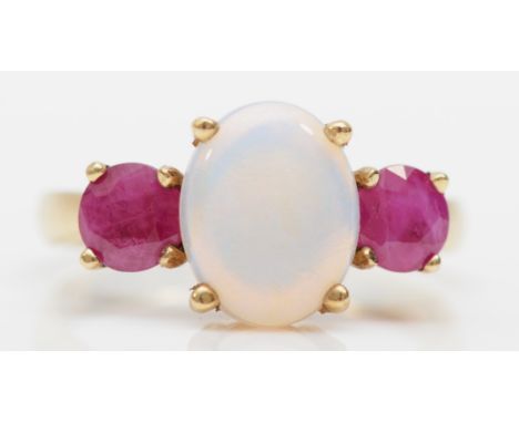 A 9ct gold three stone opal and synthetic ruby dress ring, O, 3.6gm.Condition report - Overall the ring is in good condition,