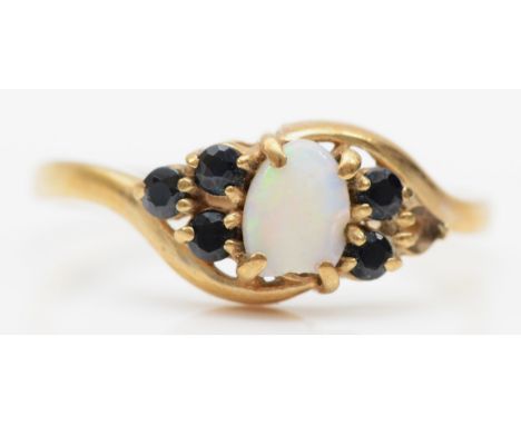 A 9ct gold opal and sapphire dress ring, M, 1.4gm.Condition report - the opal is chipped.  