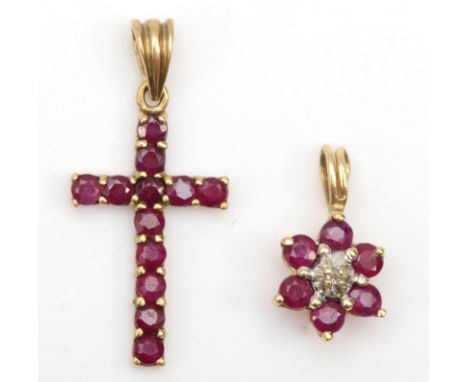 A 9ct gold ruby cross pendant, 24 x 11mm, together with an unmarked gold ruby and diamond cluster pendant, 1.2gm.Condition re