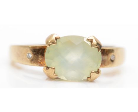 A 9ct gold green gemstone cocktail dress ring, Q, 3.8gm. 