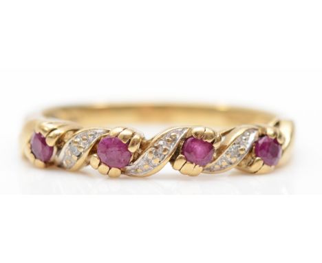 A 9ct gold ruby and diamond dress ring, N-O, 2.1gm. 