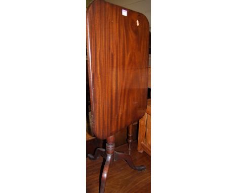 A 19th century mahogany round cornered tilt-top pedestal tripod occasional table