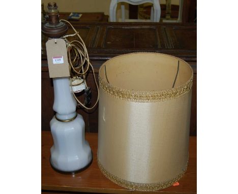 An early 20th century faceted milk glass and brass mallet shaped table lamp, with shade, h.55cm (excluding fittings)