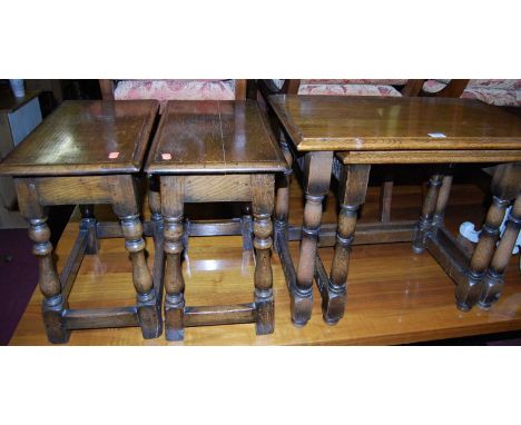 A pair of contemporary joined oak joint stools, together with an oak nest of two occasional tables (3)Condition report: All i