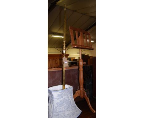 A contemporary beech music stand; together with an early 20th century brass standard lamp with shade (2)