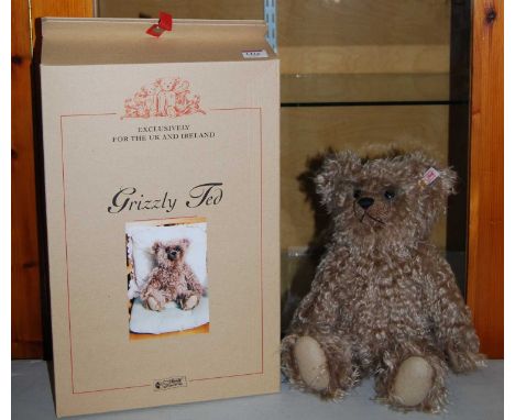 A boxed Steiff 'as-new' Gristly Ted bear, serial number 661402, with white tag in ear