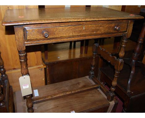 An early 20th century joined oak single drawer side table, raised on turned supports, w.83cmCondition report: Top is slightly