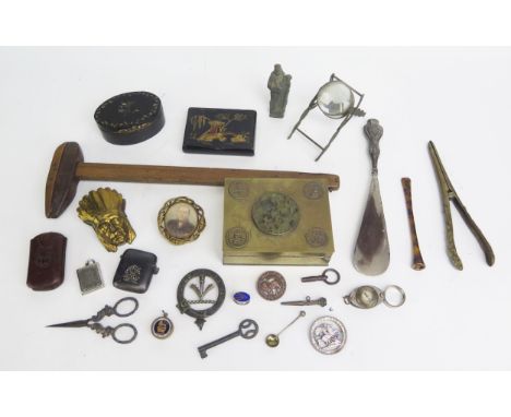 A Chinese brass box, faux tortoiseshell cigarette holder, button hook, glove stretchers, magnifying glass etc,