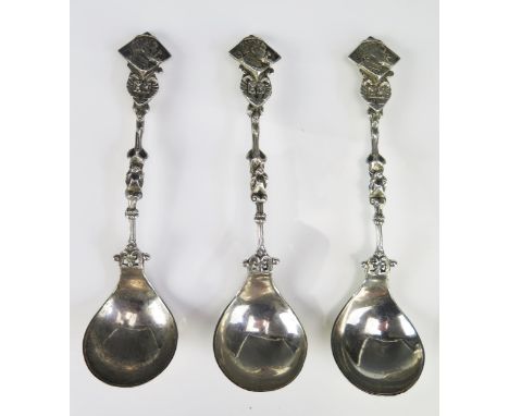 A set of three continental silver spoons, bears import marks for Chester 1897, with deep circular bowls on knopped stem and l