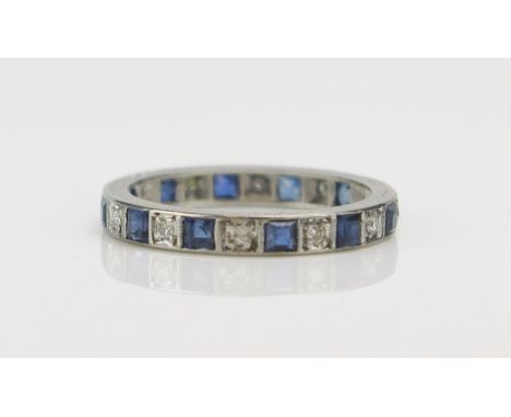 A Sapphire and Diamond Millegrain Precious White Metal Set Full Eternity Ring, size K, 2.4g