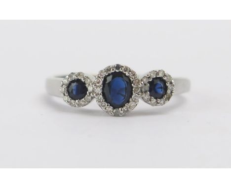 A 9ct White Gold, Sapphire and Diamond Ring, size M.5, CCM mark, 2.57g