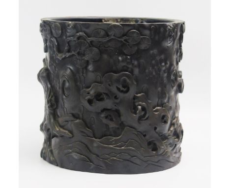 A Chinese carved and lacquered bitong or brush pot, decorated as a naturalistic tree trunk, 22cm diameter, 21cm high.