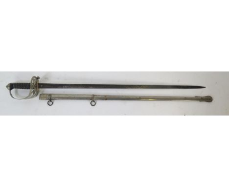 An Edward VII officers sword, with 84cm fullered blade with etched Royal cypher, triple bar guard, fishskin and wire bound gr