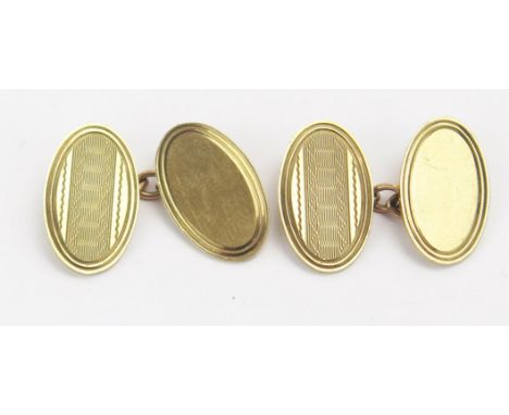 A Pair of 9ct Gold Cufflinks with engine turned decoration, hallmarked, 7.71g
