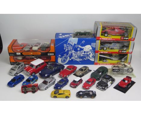 Burago and others various assorted diecast vehicles and motorcycles various scales some boxed. 