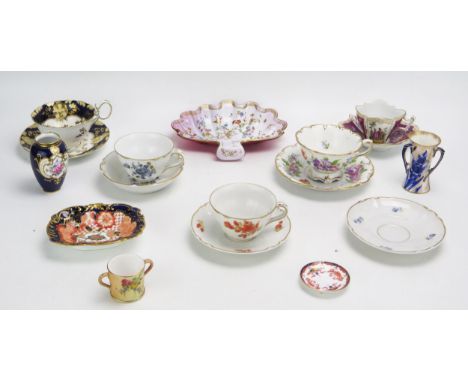 A collection of UK and continental cabinet cups and saucers, tea cups, vases and dishes. Includes Crown Derby, Royal Doulton,