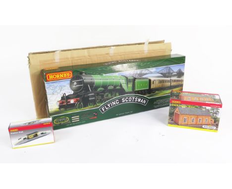 Hornby OO Gauge R1255 Flying Scotsman Train Set with The LNER Class A1 4-6-2 loco and teak coaches together with R590 Station
