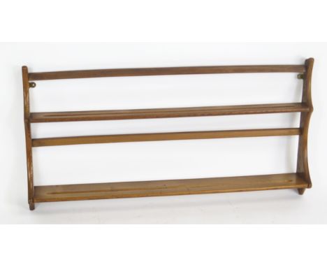 An Ercol Wall Hanging Plate Rack, 96cm wide