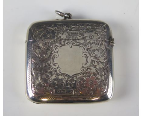 An Edward VII silver vesta case, maker Hamilton &amp; Co, Chester 1902, of square outline, with chased foliate decoration, 5.