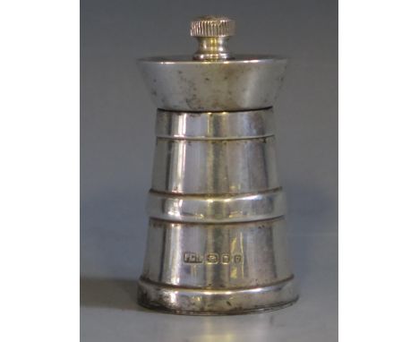 An Elizabeth II silver pepper mill, maker Park, Green &amp; Co Ltd, London 1962, of milk churn design, 7.25cm high.