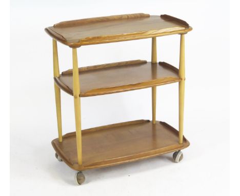 An Ercol Elm Three Tier Tea Trolley 