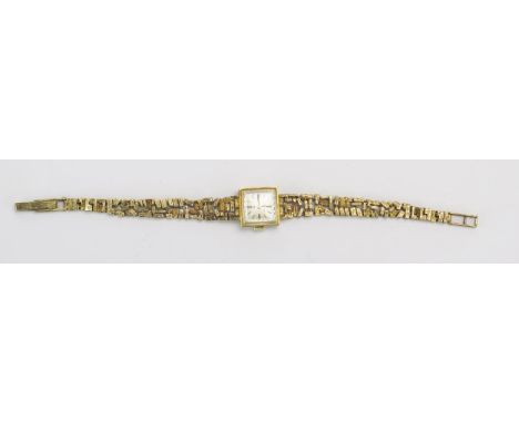 A HAMILTON Lady's 9ct Gold Wristwatch with integral bracelet, 16.48g nett gold. Needs attention