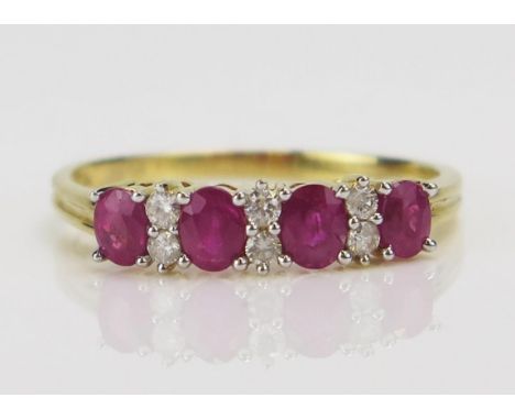 An 18ct Gold, Ruby and Diamond Ten Stone Ring, size R.5, CCM mark, 3g