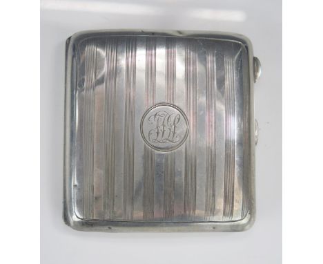 A George V silver cigarette case, maker William Neale &amp; Son, Birmingham, 1915, monogrammed, with engine turned decoration