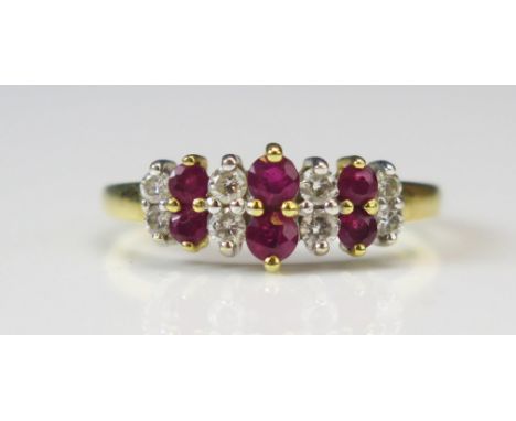An 18ct Gold, Ruby and Diamond Two Row Ring, size O, stamped 750 .25CT, 3.15g, Boodle &amp; Dunthorne box
