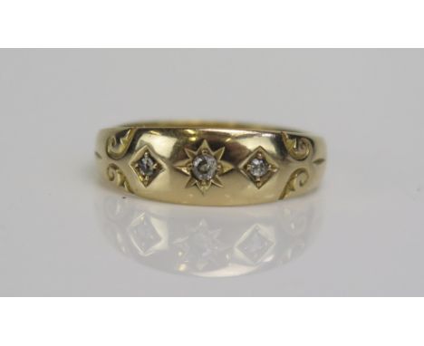 A 22ct Gold and Diamond three Stone Gypsy Ring,  c. 2.1mm principal old cut, size R, Birmingham 1937, 4.08g
