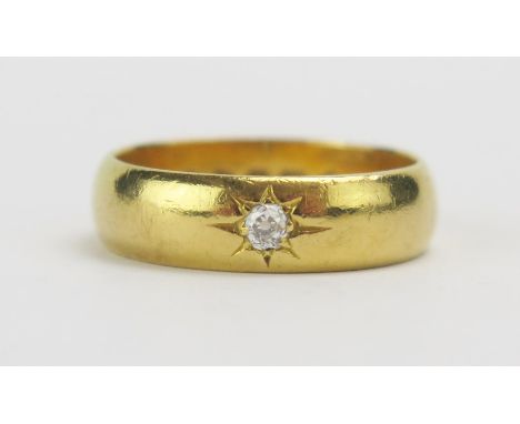 A Victorian 22ct Gold and Old Cut Diamond Gypsy Ring, c. 2.5mm stone, 5.2mm wide, size M, London 1882, 5.8g