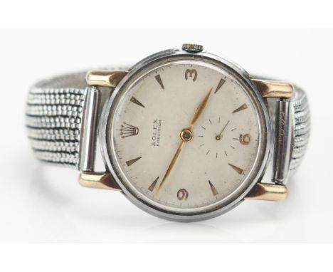 A ROLEX PRECISION Gent's Stainless Steel Manual Wind Wristwatch, caliber 4098, with precious yellow metal lugs, c. 35.4mm cas