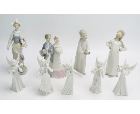 Five assorted Lladro porcelain figures, all boxed.