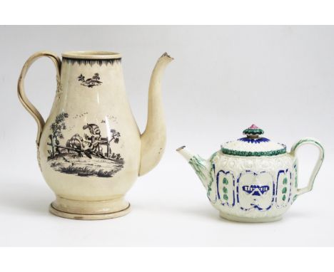 A 19th century creamware teapot and cover with moulded decoration, 18cm long, together with a cream ware coffee pot with tran