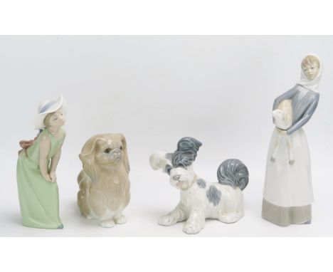 Four assorted Lladro porcelain figures and dogs, all boxed.