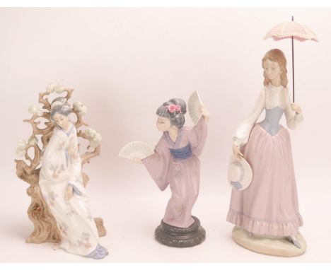 Three large Lladro porcelain figurines, all boxed.