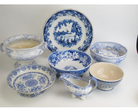 A Delft charger decorated with a stag in a country landscape, a/f, assorted blue and white transfer print wares including bow