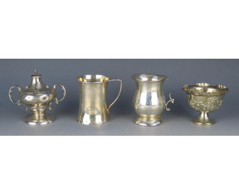 A mixed collection of silver wares, various makers and dates including, christening cups, oil lamp and platedpedestal salt, t