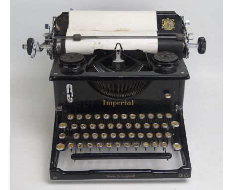 An Imperial manual typewriter, with black enamel body.