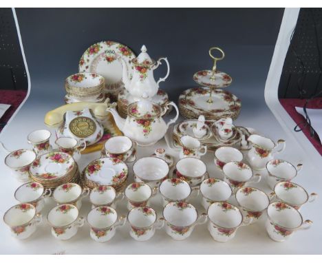An extensive selection of Royal Albert "Old Country Rose " patter tea and dinner wares, includes cake stand, teapot, coffee p